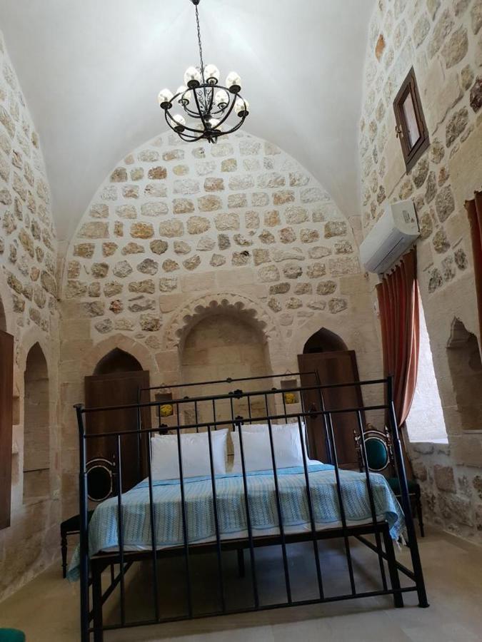 Tarihi Ulu Cami Yani, Tarihi * Mardin