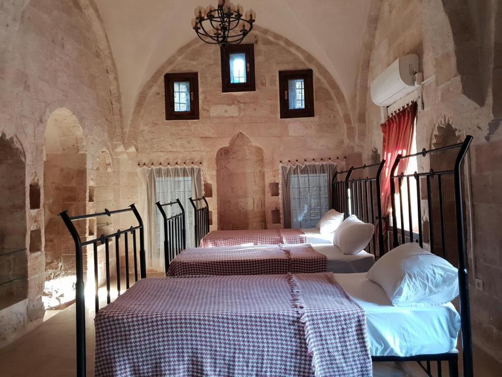 Tarihi Ulu Cami Yani, Tarihi * Mardin